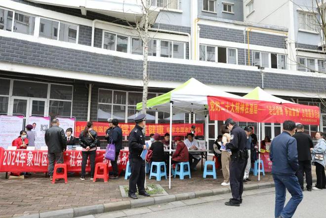 三月“学雷锋”普法正当时｜象山区法院开展新时代文明实践志愿服务暨法律进社区活动(图1)